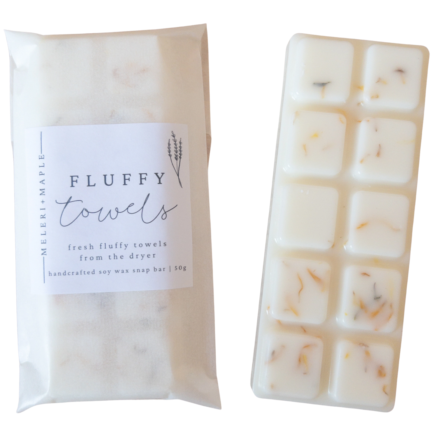 Soy wax melts snap bar with packaging labeled 'Fluffy Towels' on a white background