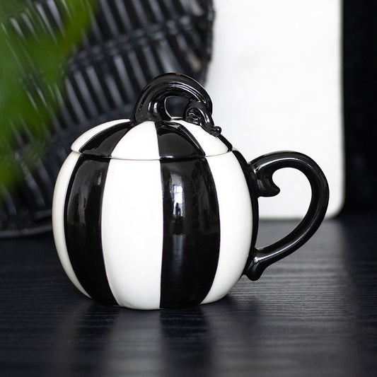 Black and white striped pumpkin lidded mug for Halloween and gothic home decor