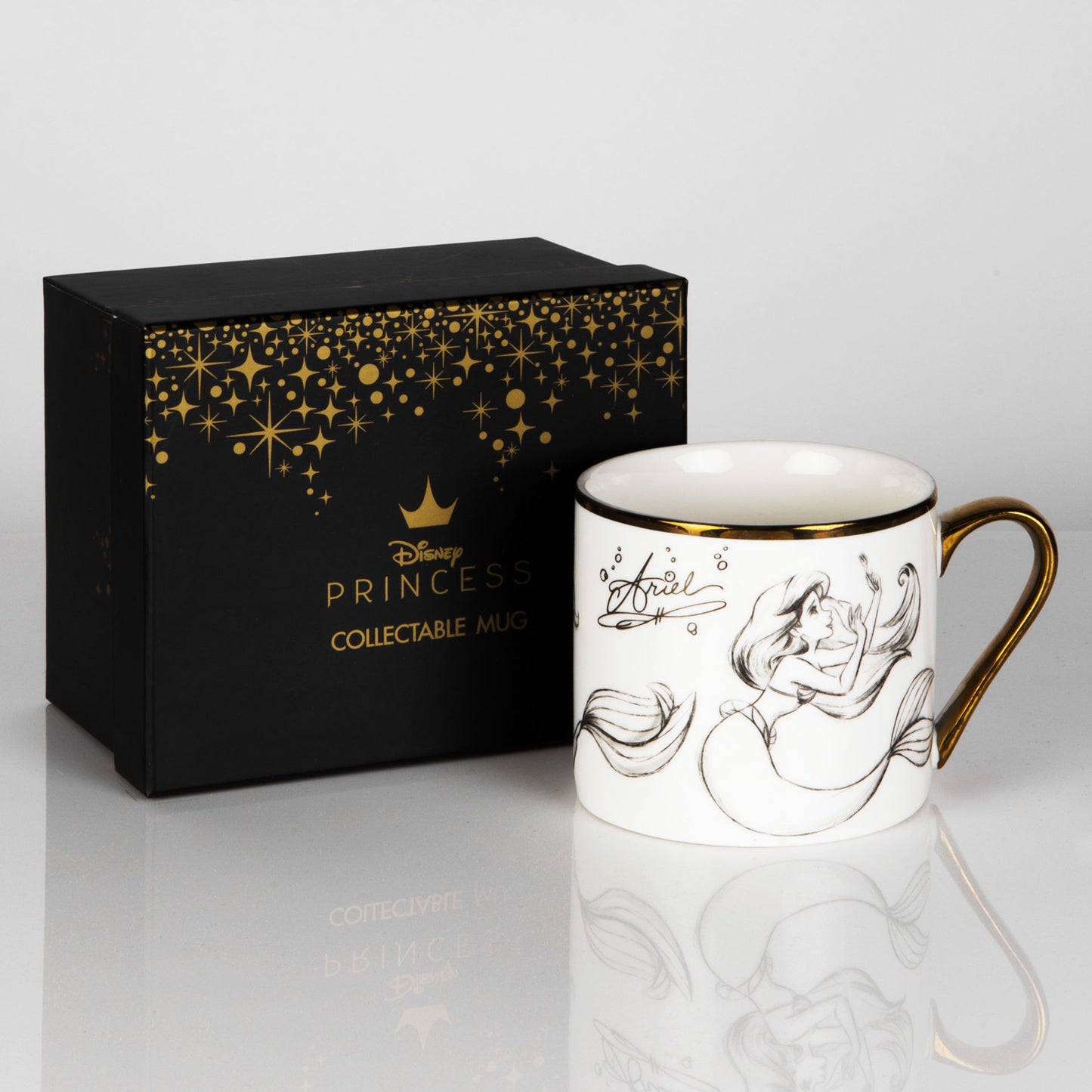 classic pencil illustration Ariel mug, with gilt handle and 'Part of Your World' hidden message on the inside base. Complete with a black and gold foiled box,