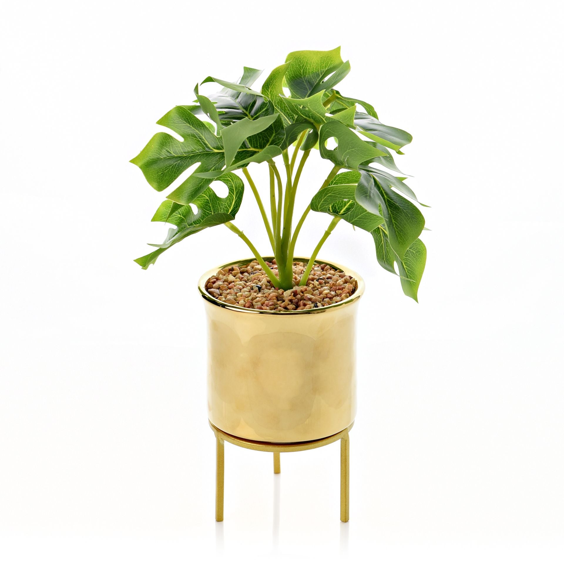 gold footed planter with faux plants 27cm