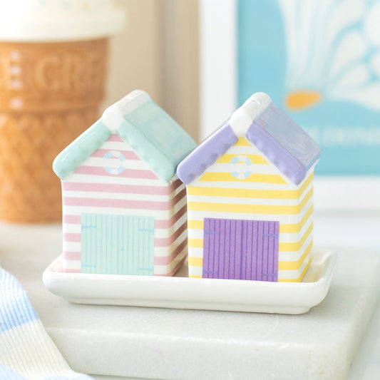 beach hut pastel salt and pepper shakers on a ceramic white tray