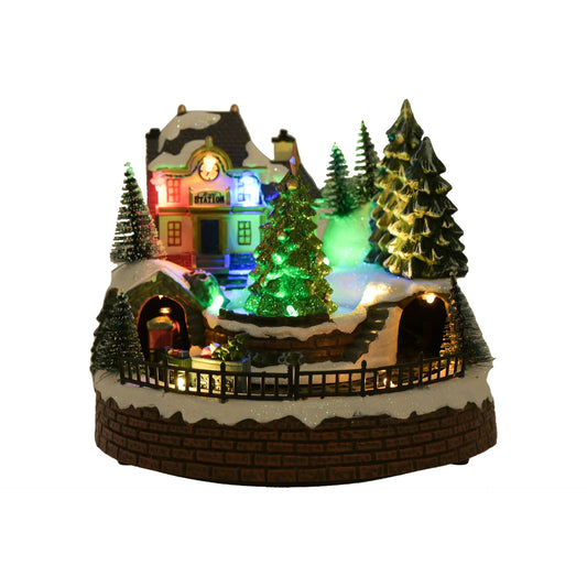 LED musical station with rotating train christmas trees and snow effect