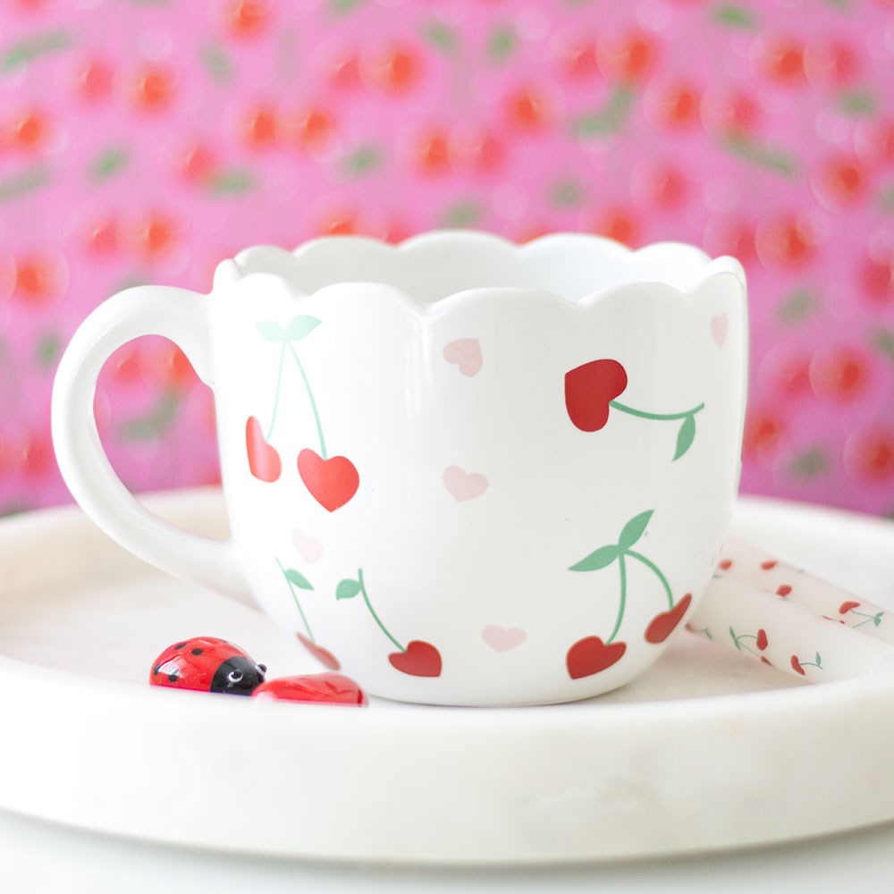 scalloped cherry print ceramic mug in white with red cherries and pink hearts 