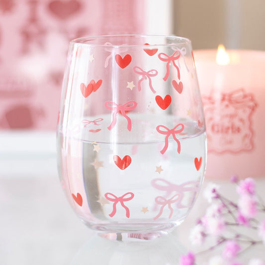 Clear glass with pink bows and hearts on 