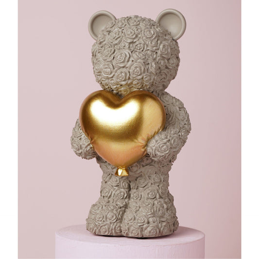 grey bear ornament holding h=old heart in both hands