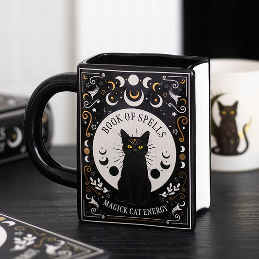 Black cat book shaped mug with gothic spell book design
