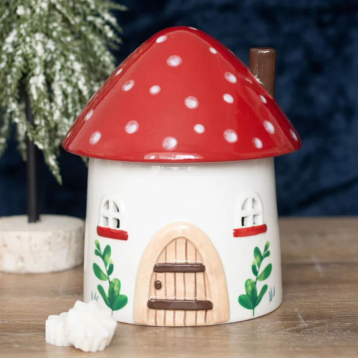 mushroom house burner with cut out windows red roof with white spots