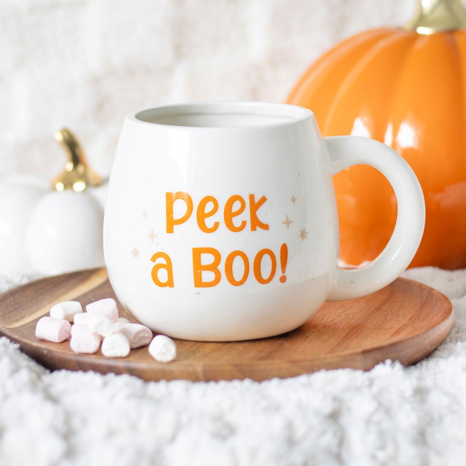 peek a boo white ghost mug with orange font and ghost hidden inside 