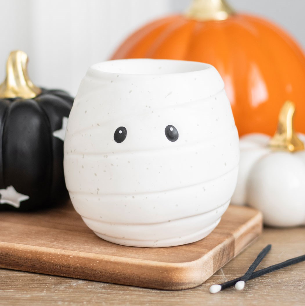 Mummy shaped ceramic oil burner and wax warmer for Halloween décor and autumn home fragrance
