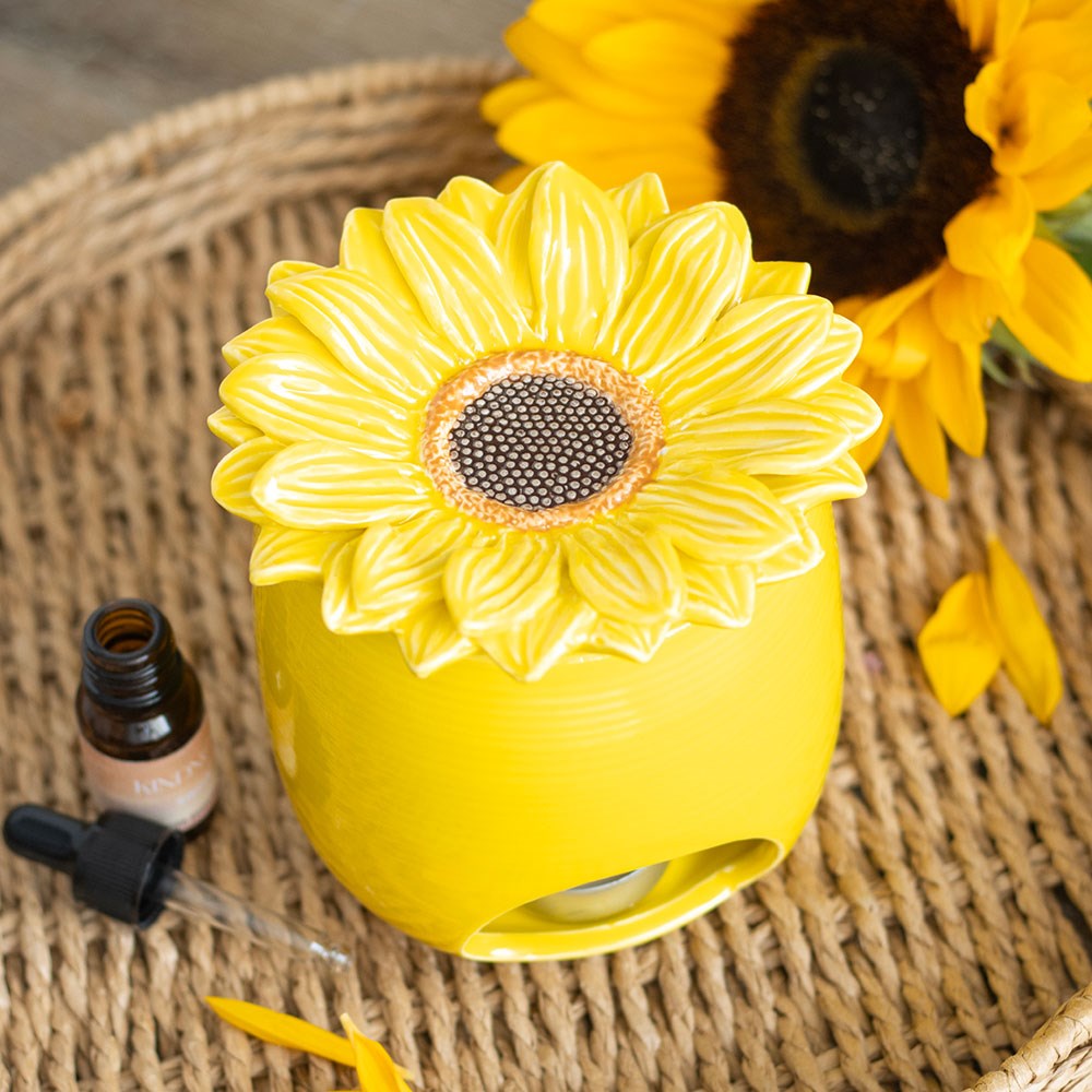 sunflower wax warmer & oil burner in yellow and shaped as a sunflower