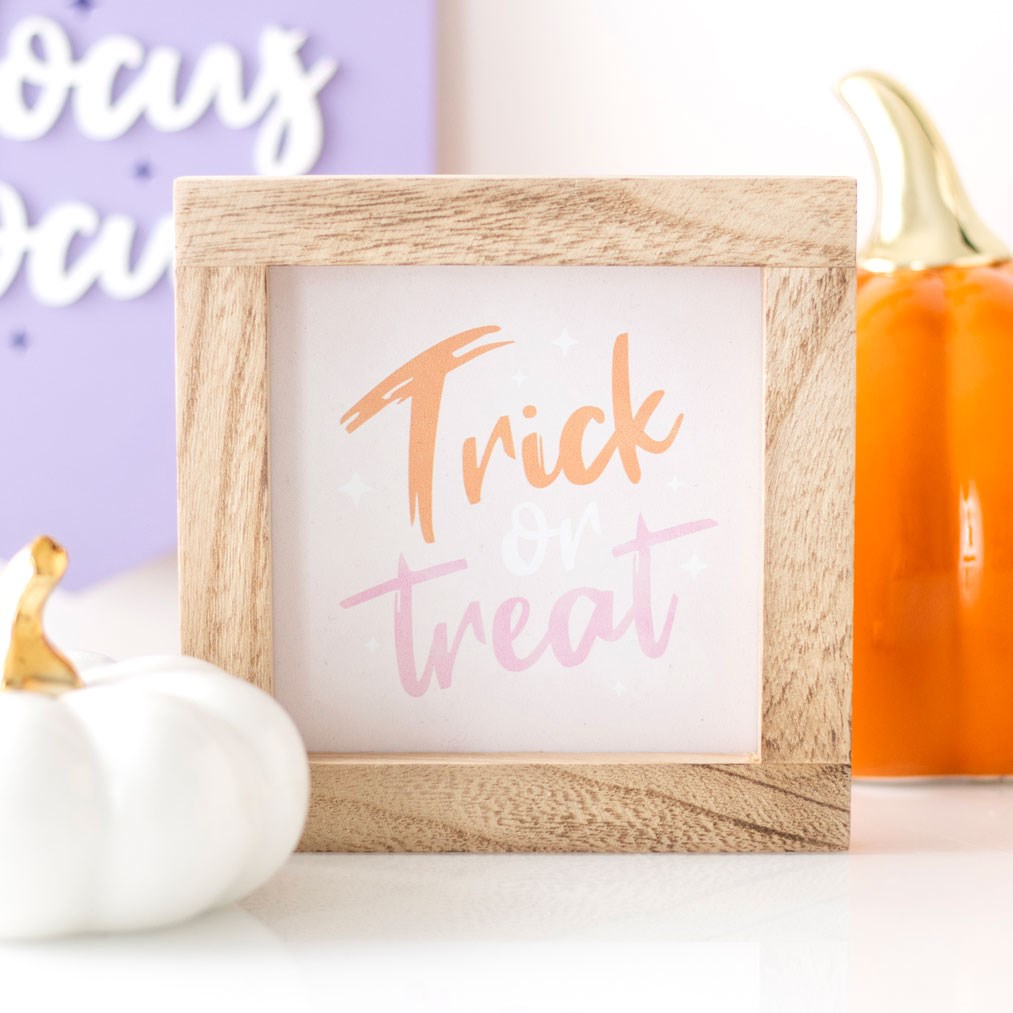 Pink Trick or Treat wooden frame sign in pastel pink white and orange Halloween home decoration