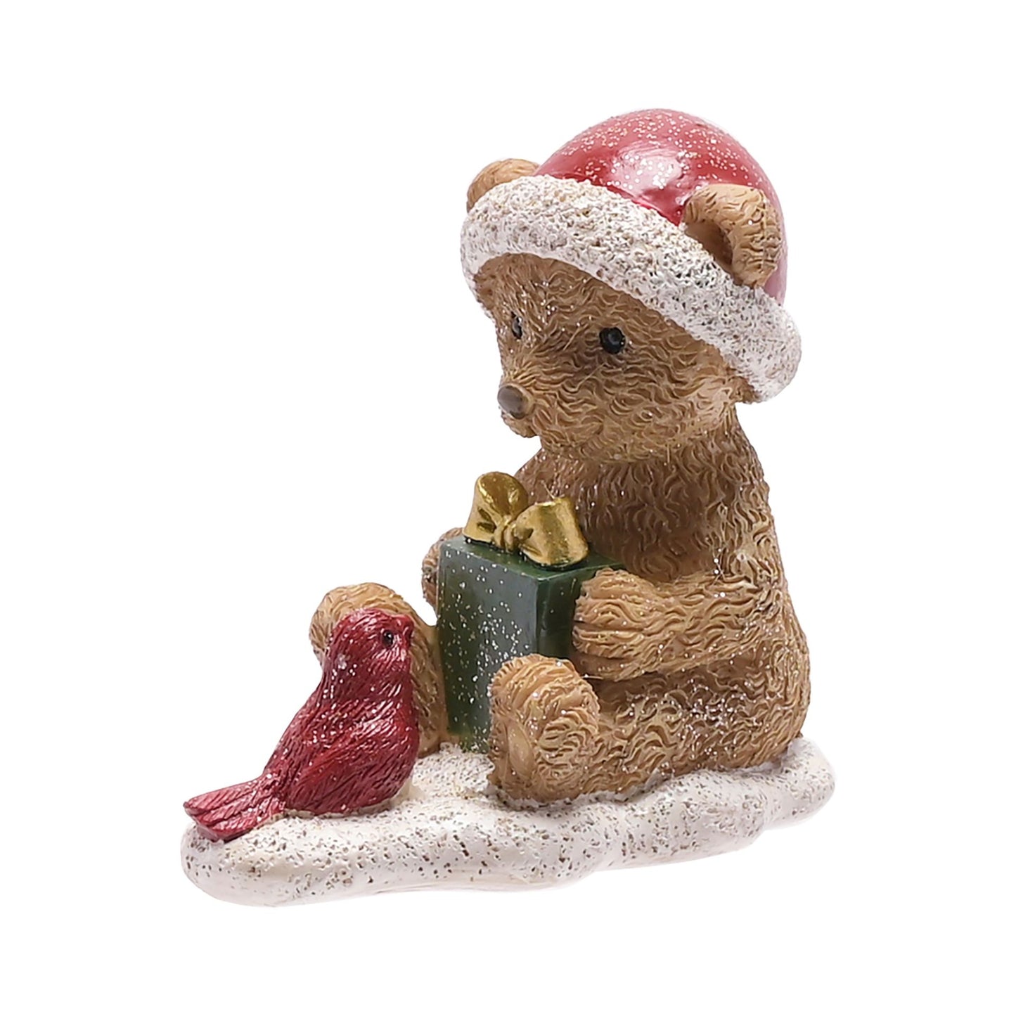 teddy bear wearing a red santa hat holding a present looking at a bird figurine