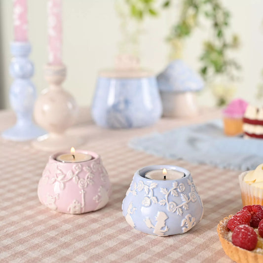 Alice In Wonderland tea light holders in pink and blue