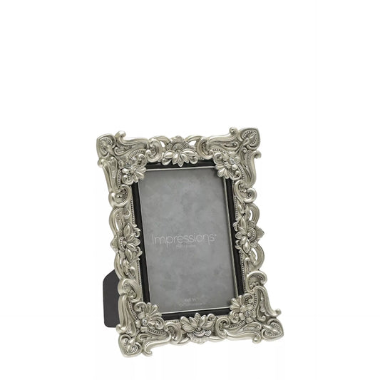 Decorative silver antique photo frame with 'Impressions' branding 4x6