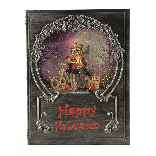 16x20cm Halloween book spinner with smiling skeletons and spinning glitter effect