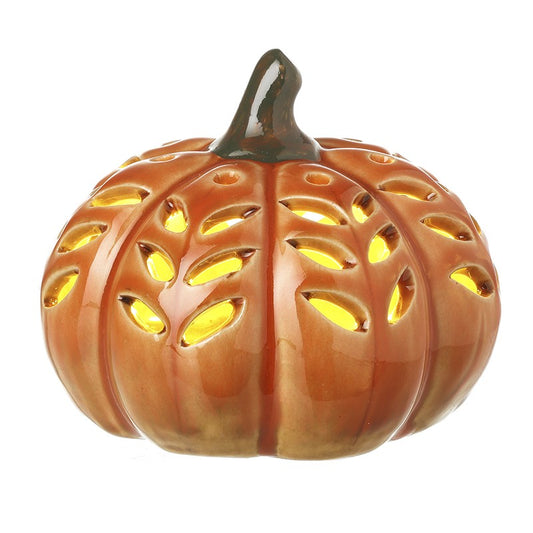 Decorative pumpkin lantern with cut-out design 