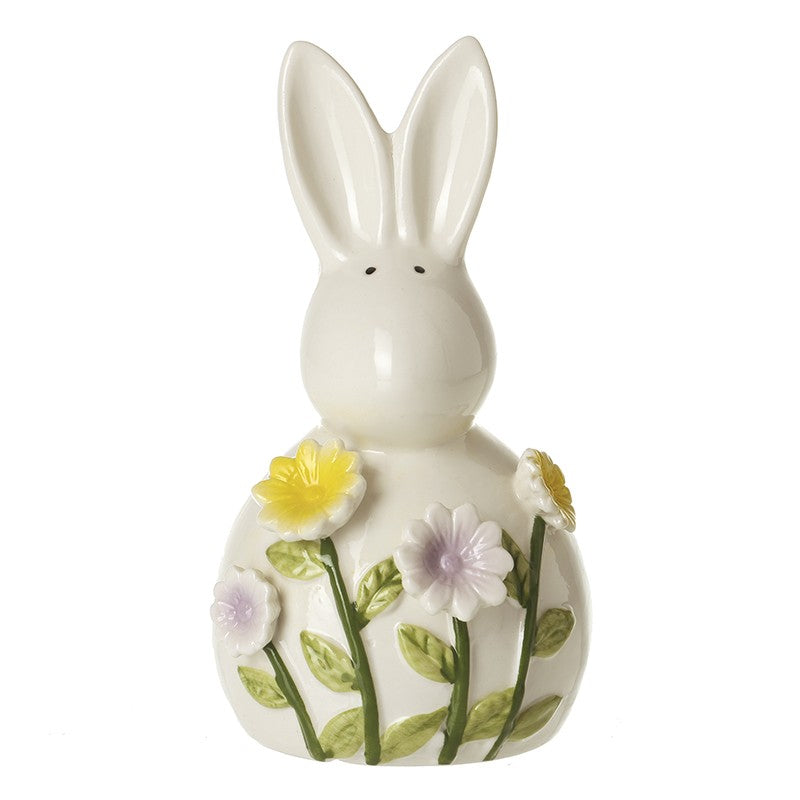 White ceramic bunny figurine with floral design in colourful colours