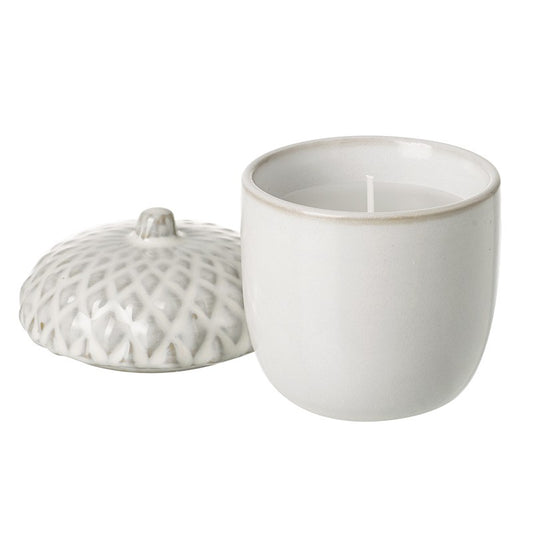 white porcelain pinecone candle