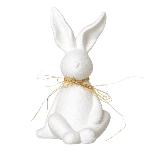 White porcelain bunny figurine with a string around neck