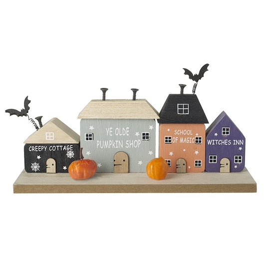 Set of Halloween-themed houses with pumpkins bats cottage
