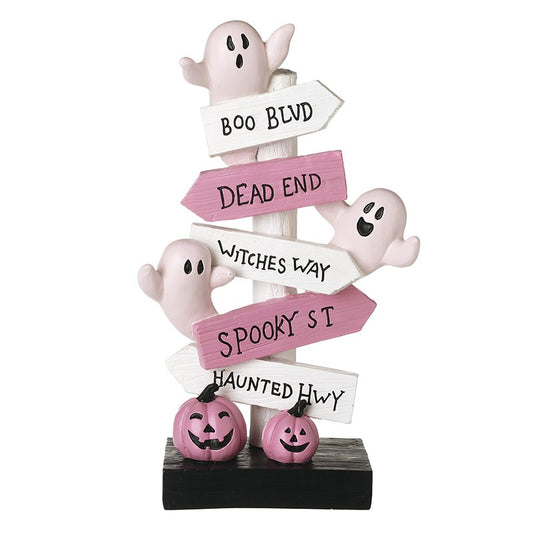 pink and white ghost street sign block and pink pumpkins