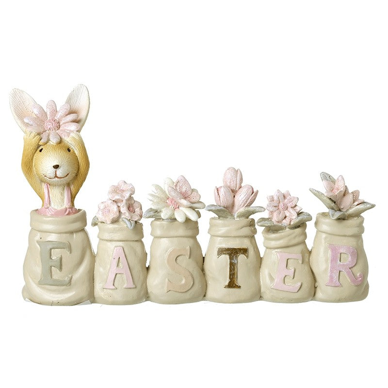 Decorative Easter set with bunny figure and jars spelling 'Easter' 
