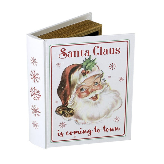 Decorative storage book box with Santa Claus illustration and text on front in red