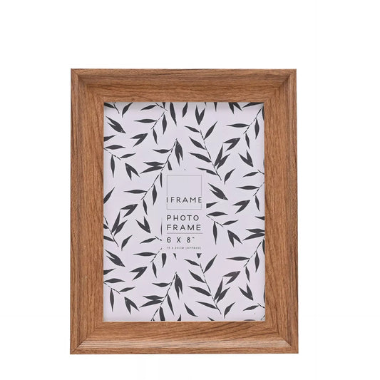 Wooden photo frame with a leaf patterned paper insert 6x8
