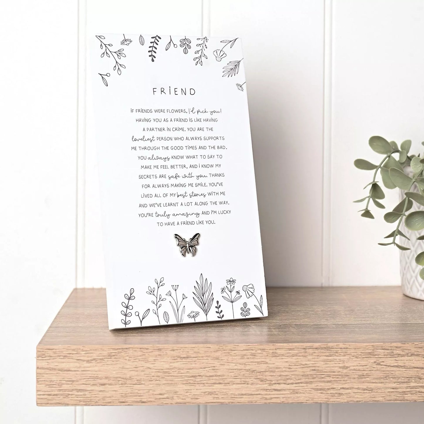 verse plaque with a poem titled 'Friend' on and butterfly