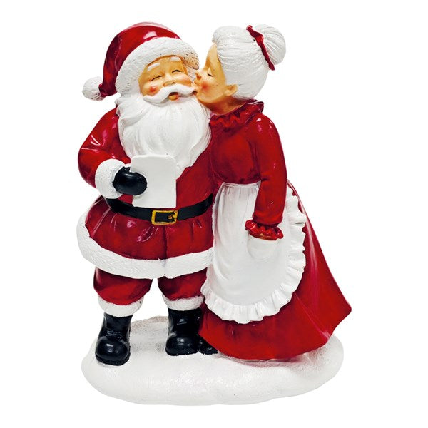 Mr and Mrs Claus Christmas figurine kissing in traditional red and white outfits