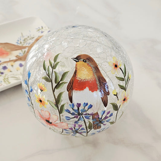 Decorative led  glass ball with a robin bird and floral design 