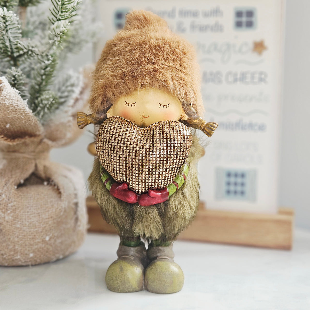 Standing Resin Girl Christmas Ornament with Faux Fur Hat & Gold Heart