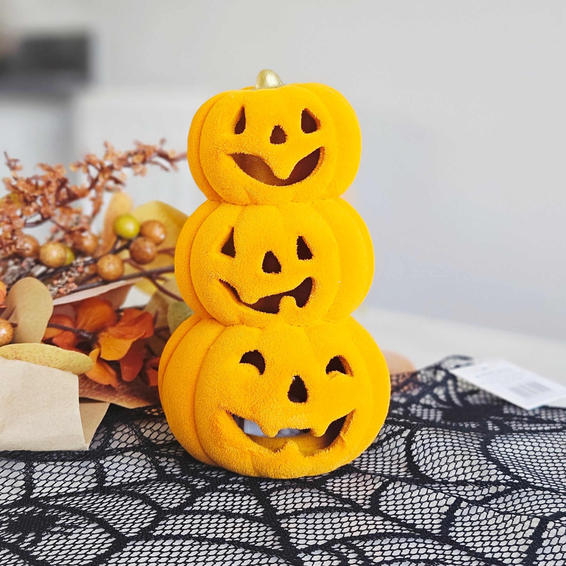 Light up ceramic trio of pumpkins stack Halloween decoration with warm LED glow for autumn home décor