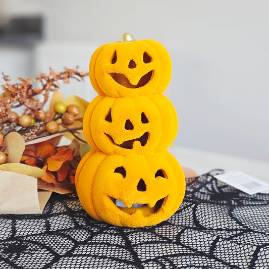 Light up ceramic trio of pumpkins stack Halloween decoration with warm LED glow for autumn home décor