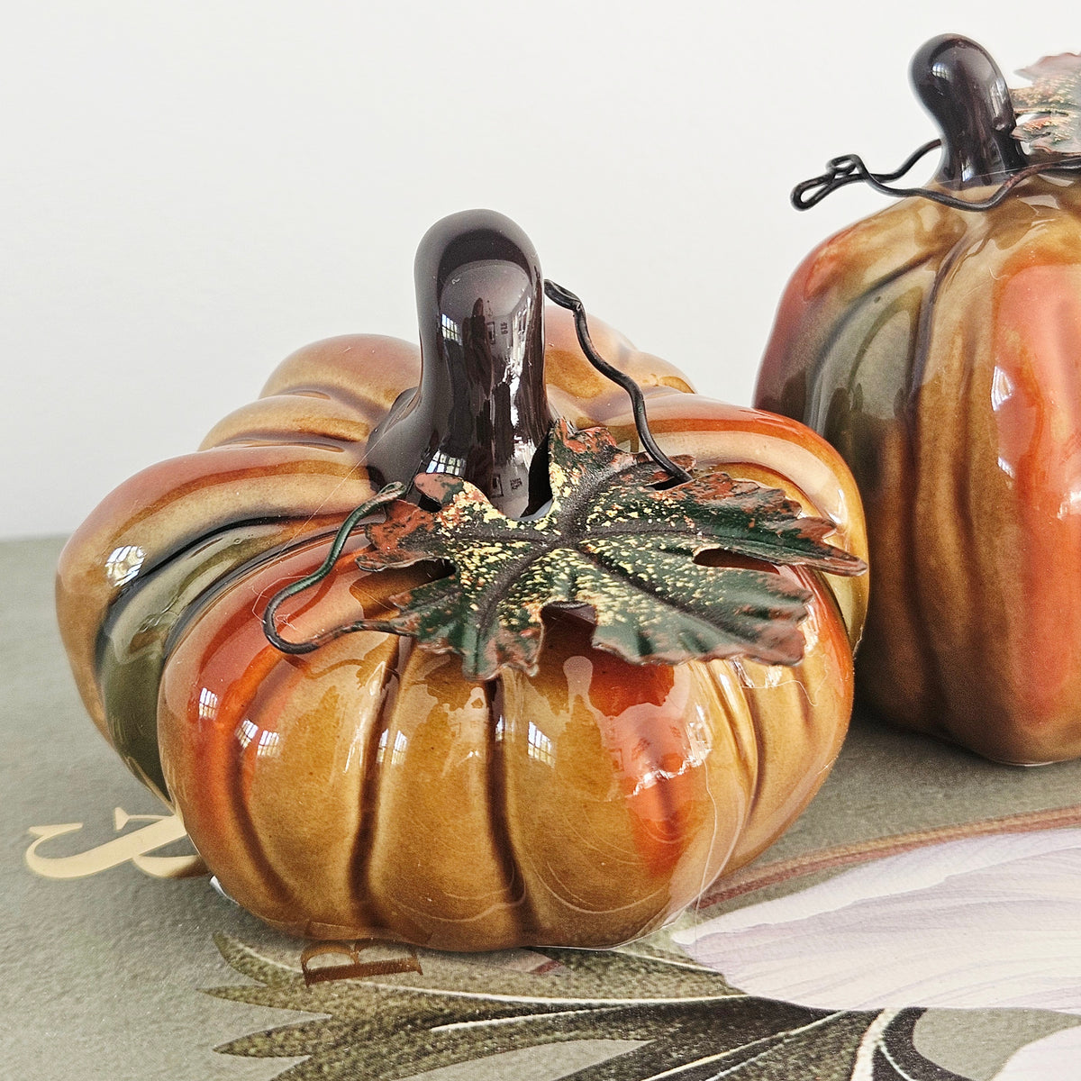 Small ceramic pumpkin with metal leaf autumn decoration