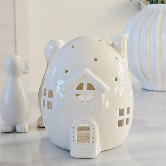 White ceramic egg  house-shaped tea light holder for easter