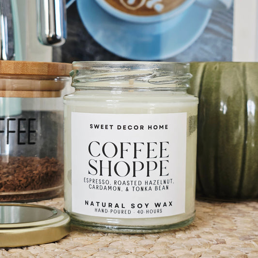 Candle labeled 'Coffee Shoppe' by Sweet Decor Home espresso, roasted hazelnut, cardamon and tonic bean natural soy wax