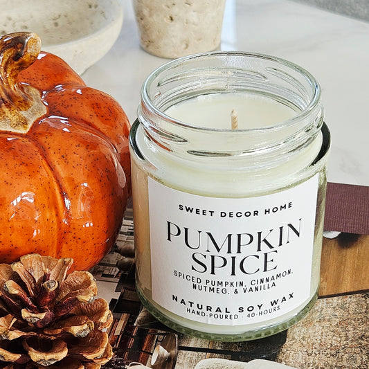 Pumpkin spice scented candle with a white label and black font by sweet decor home, 40hrs burn 190ml natural soy wax