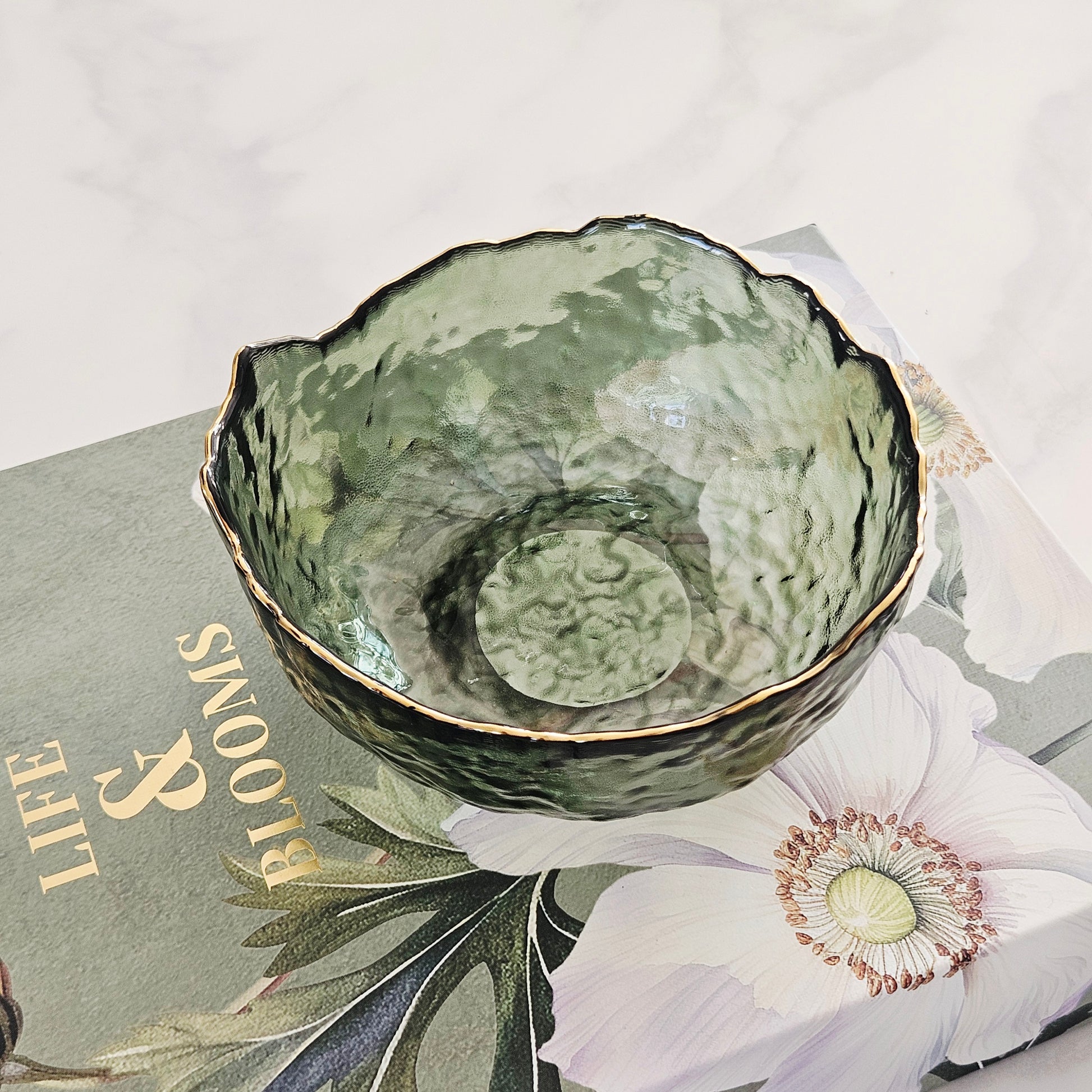 small Green glass bowl with a gold rim with wavy details 13cm