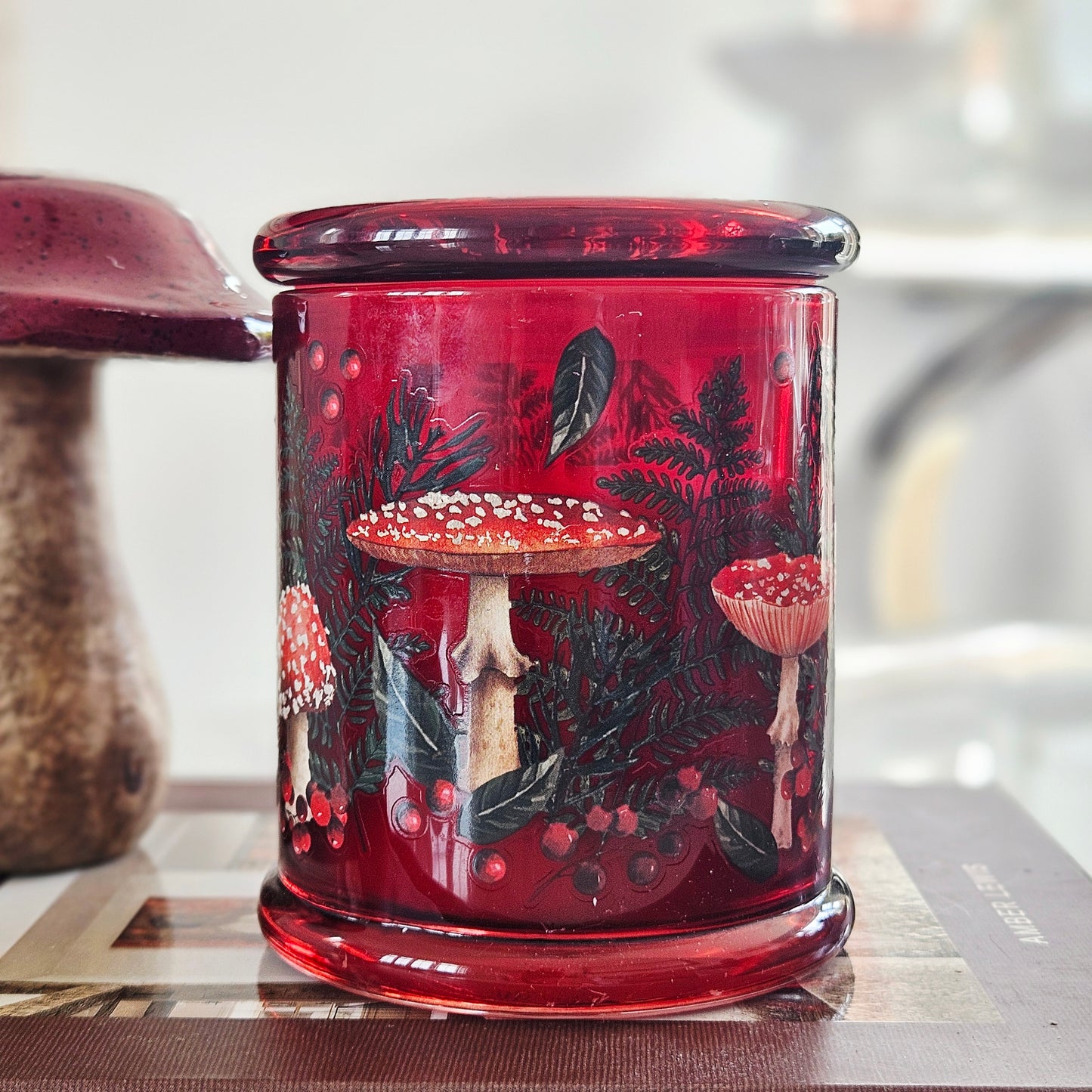 Large toadstool glass scented candle with woodland Flora & Fauna design in decorative glass jar