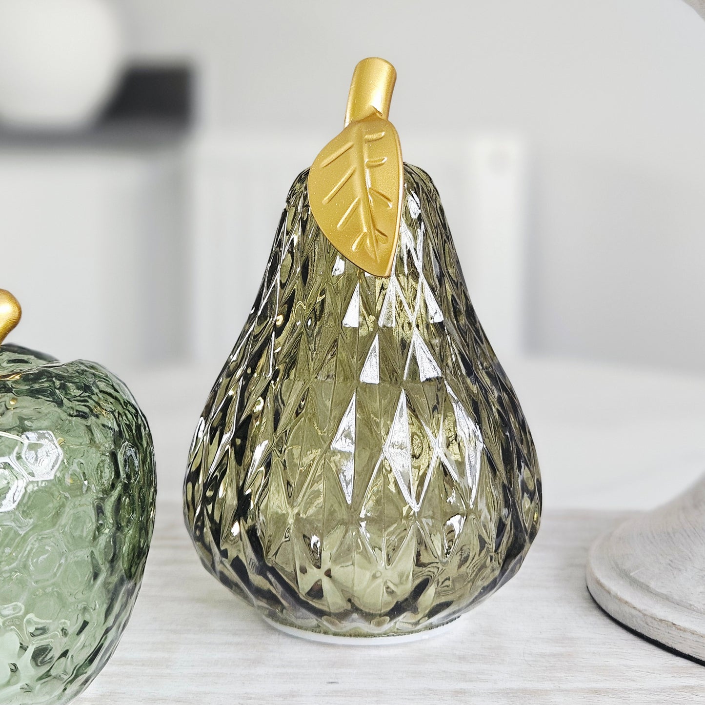 green small decorative glass pear with gold leaf top led lights