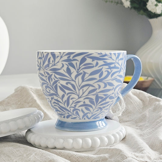 Blue and white patterned leafy trellis mug by Jeff banks home