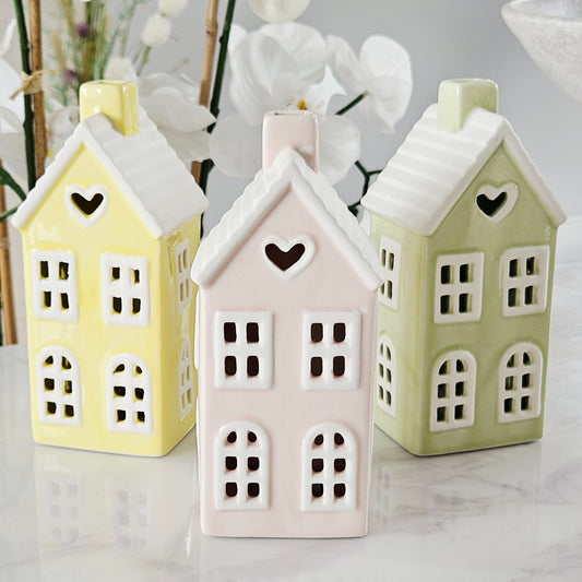 Led houses pastel colours yellow, pink, green with heart detail