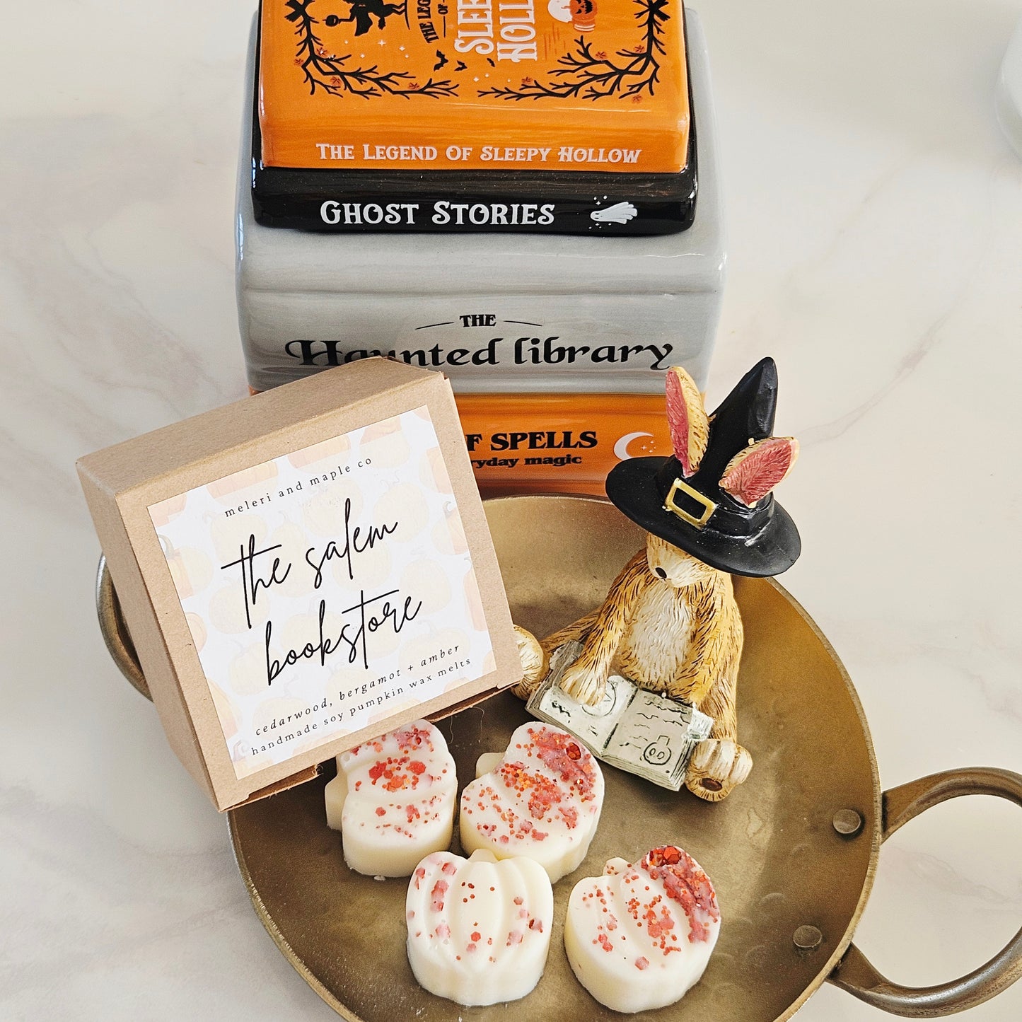 The Salem Bookstore Pumpkin Patch soy wax melts with autumn pumpkin design, handmade seasonal wax melts for cosy fall home fragrance and Halloween décor.