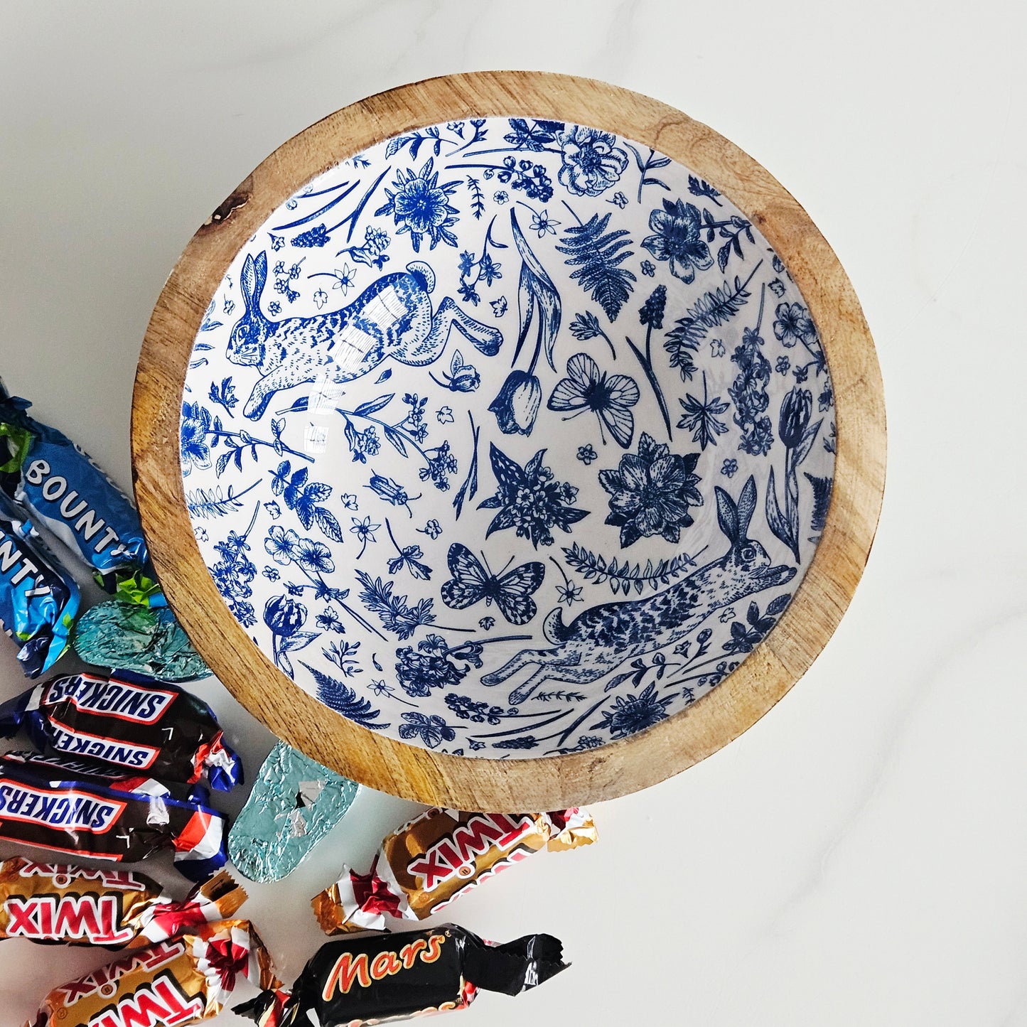 Decorative rabbit wooden bowl with blue floral and animal pattern 
