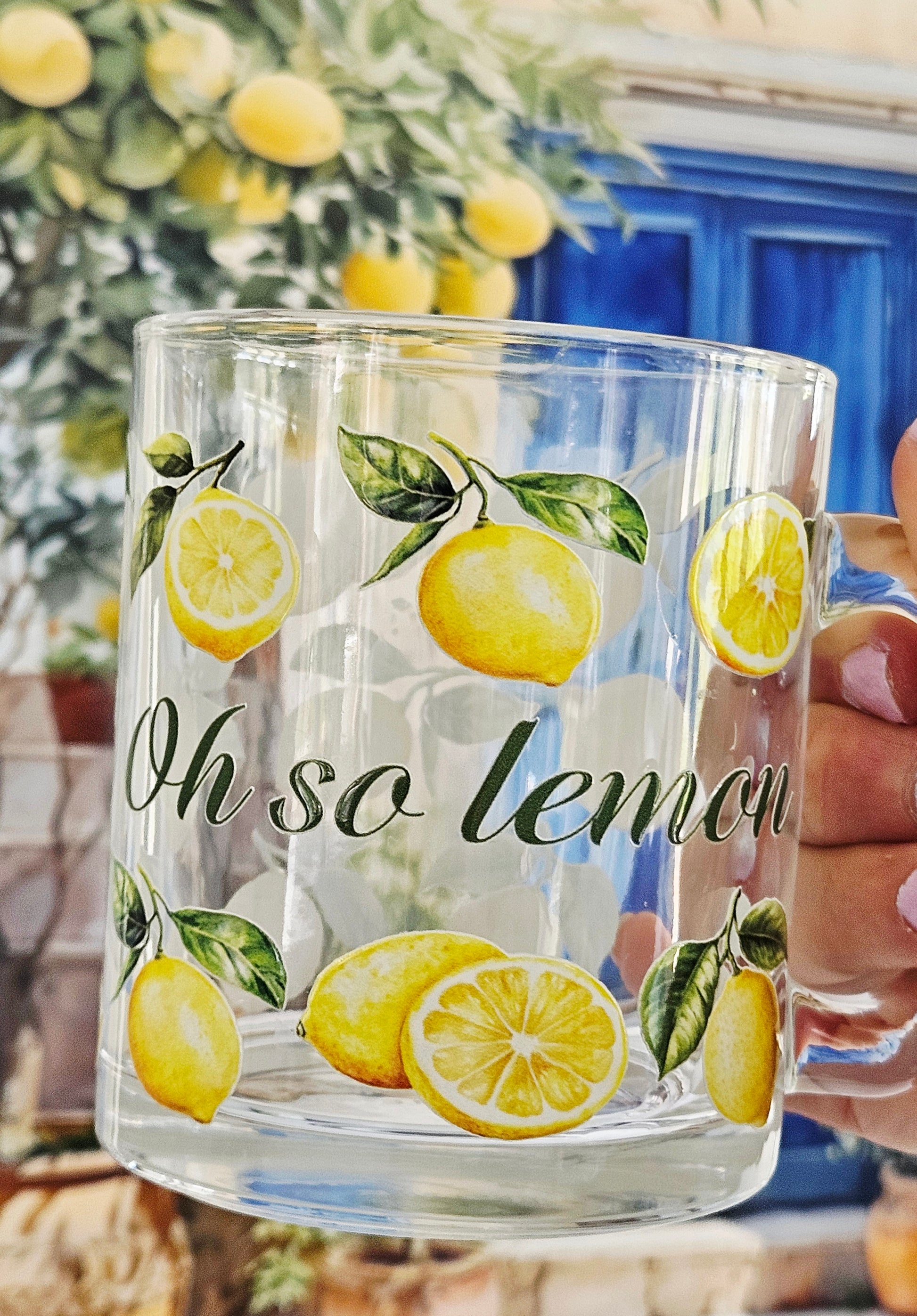 Clear glass mug with lemon designs and 'Oh so lemon' text