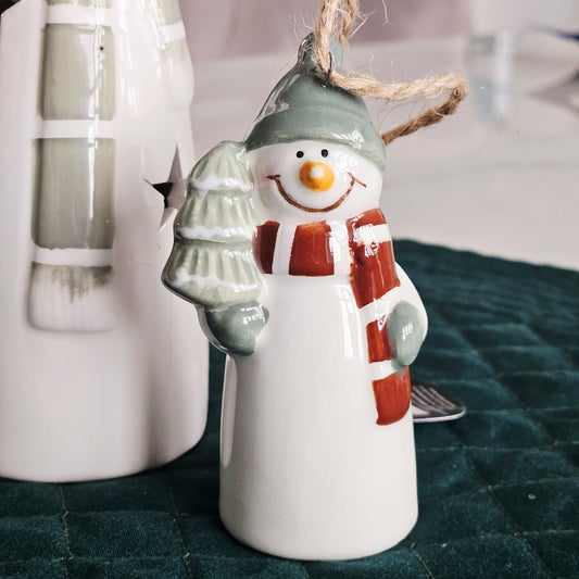snowman tree decoration holding tree tree and red scarf