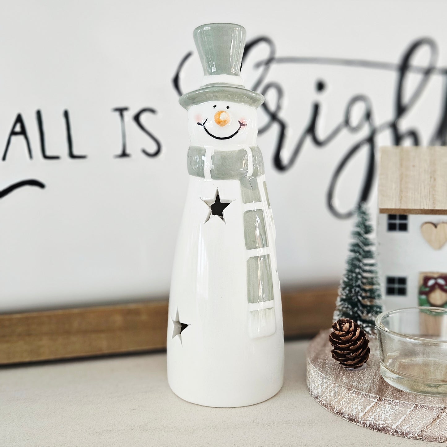 Decorative snowman led and star cut outs in white and green