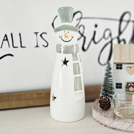Decorative snowman led and star cut outs in white and green
