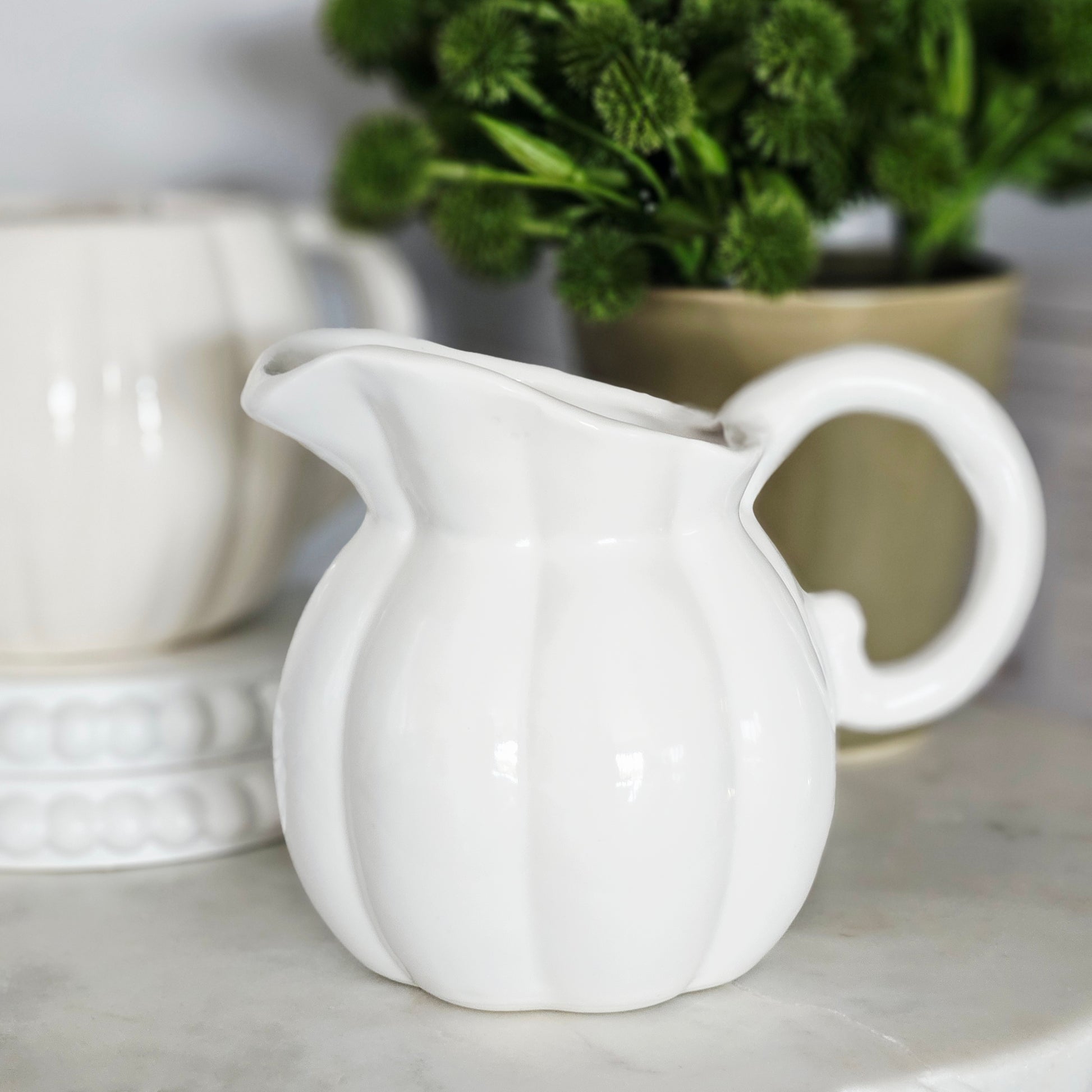 white ceramic pumpkin jug 